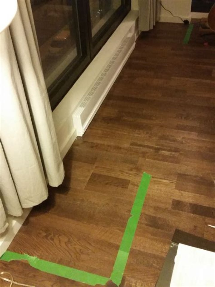 Will masking tape damage hardwood floors?